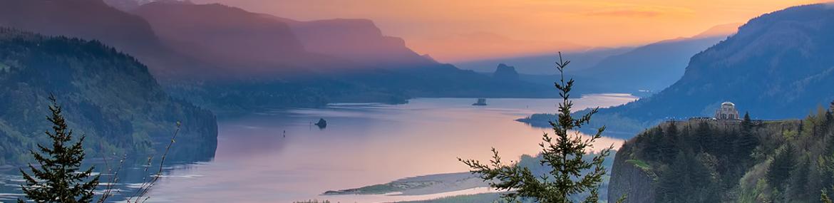 Image of mountains and water with trees 