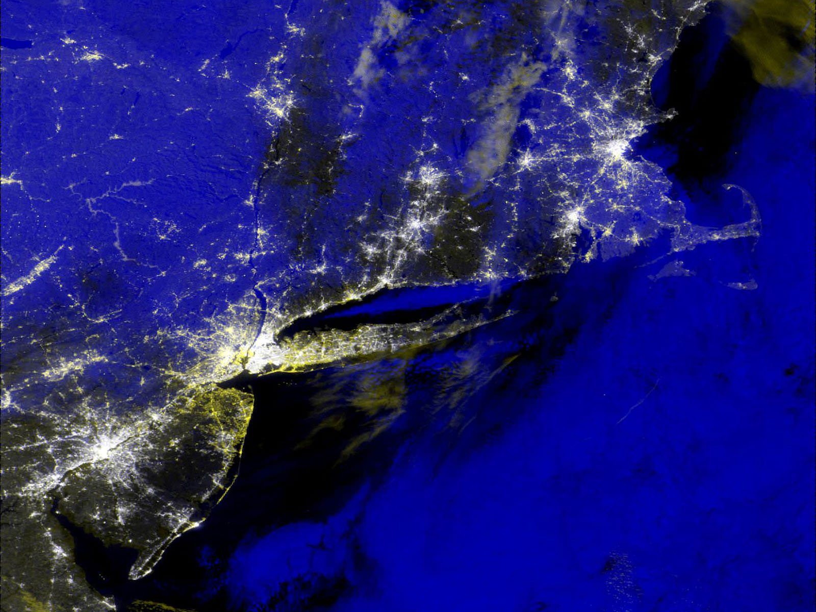 An early-morning view of New Jersey on November 1, 2012. The white areas are city lights, but the yellow spots aren’t – they’re outages highlighted for responders