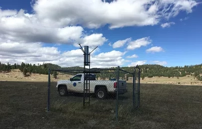 photo of truck with rain gauge