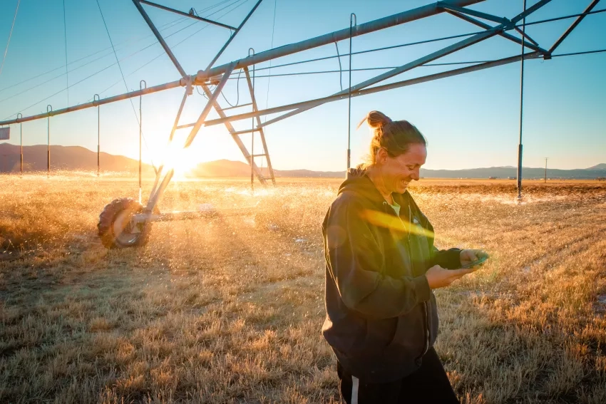 Photo of Nevada Denise Moyle in her alfalfa field