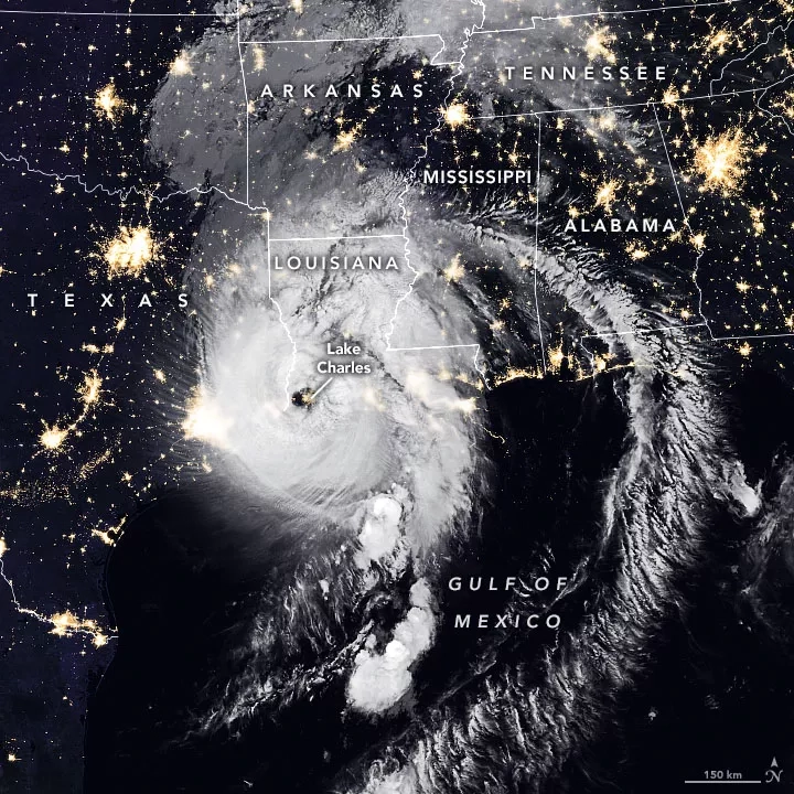 The Visible Infrared Imaging Radiometer Suite (VIIRS) onboard the NOAA-20 satellite acquired this image of Hurricane Laura at 2:50 a.m. CT on August 27, 2020, about two hours after the storm made landfall. Clouds are shown in infrared using brightness temperature data, which is useful for distinguishing cooler cloud structures from the warmer surface below. That data is overlaid on composite imagery of city lights from NASA’s Black Marble dataset. Credit: NASA Earth Observatory