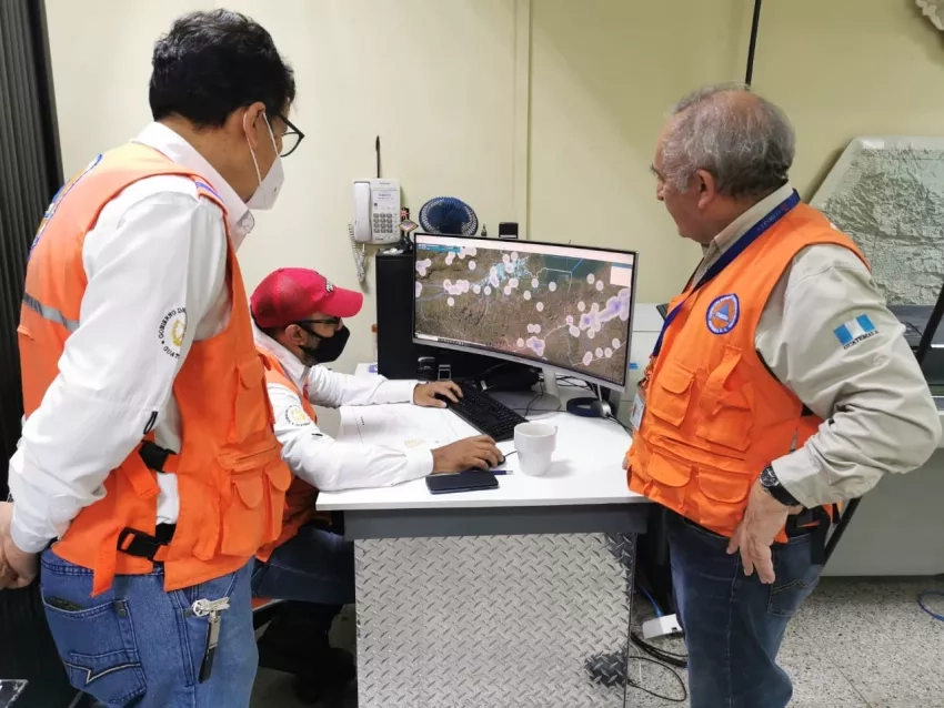 Disaster coordinators from CONRED analyzing NASA data through the AVE system. Credit: CONRED