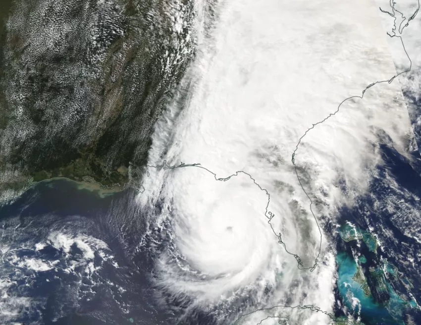 A satellite image of Hurricane Helene near Florida, with storm clouds extending far into the southeastern U.S.