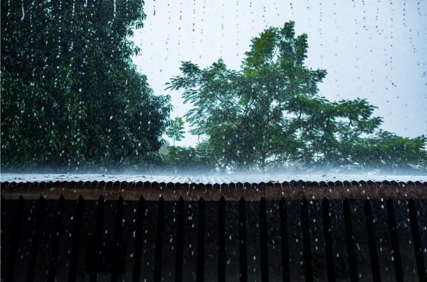 photo of rain on a roof