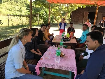 Photo of Tatiana Loboda at an outdoor cafe.