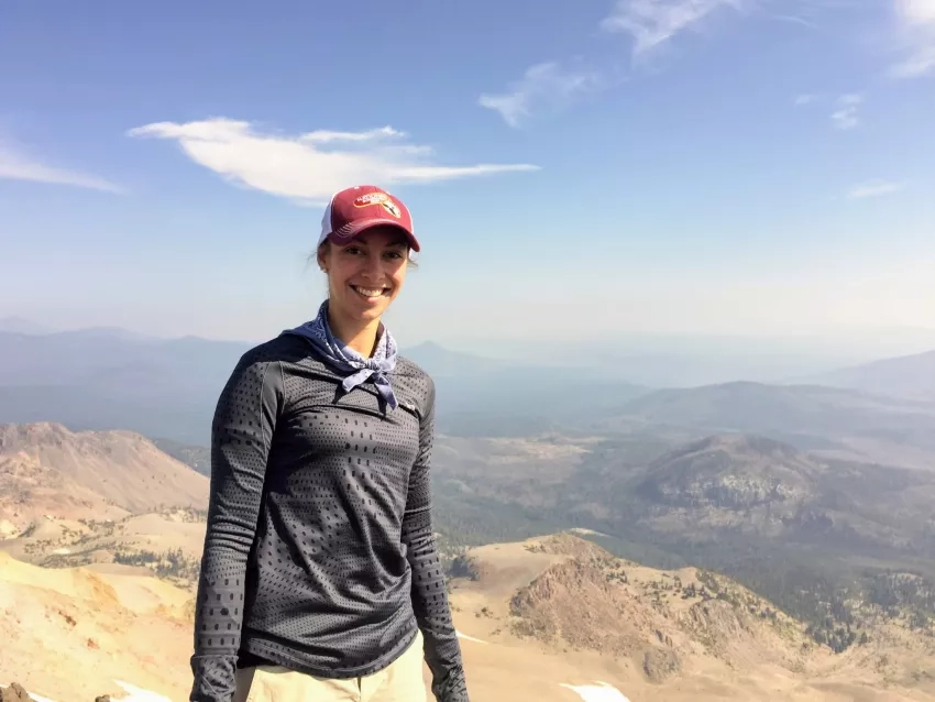 Elodie Macorps poses for a picture in Lassen Peak, California in 2017. Credits: NASA/Elodie Macorps