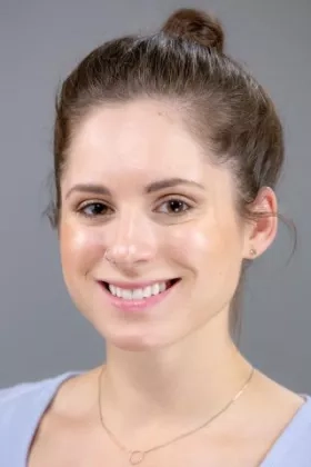 photo of woman smiling warmly