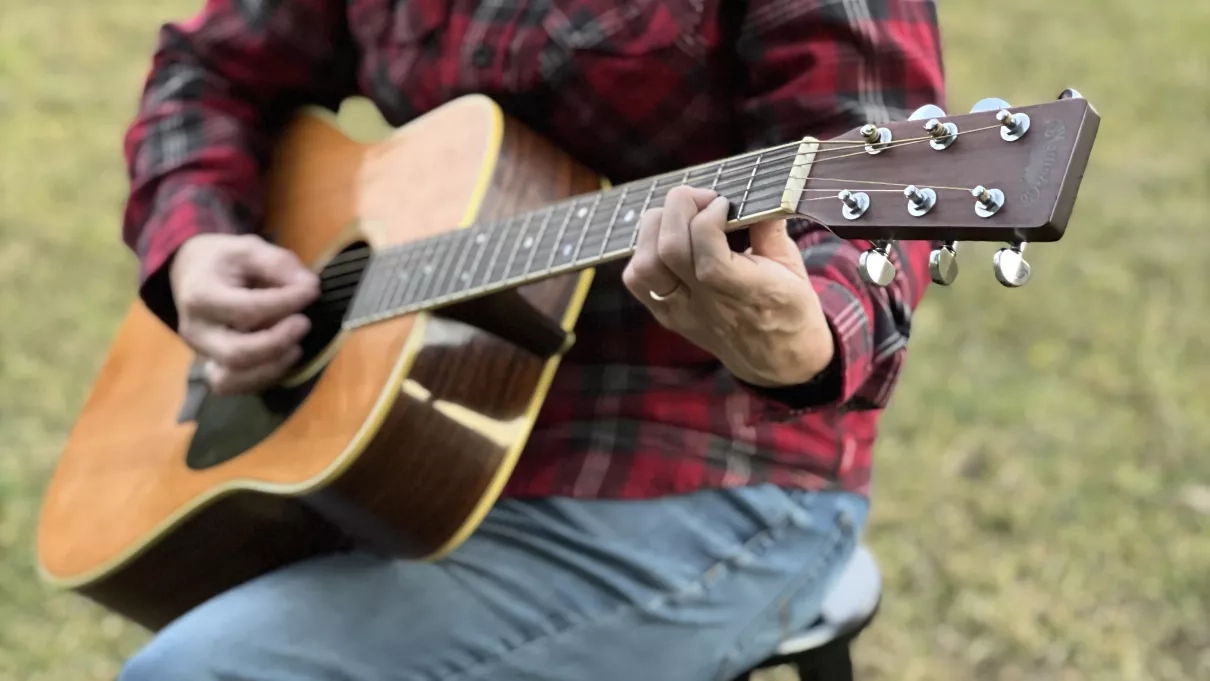 A local songwriter performs on “The Lawn” in front of Massey Center at Belmont University in Nashville, Tennessee in Oct. 2023. Credits: NASA/Seph Allen