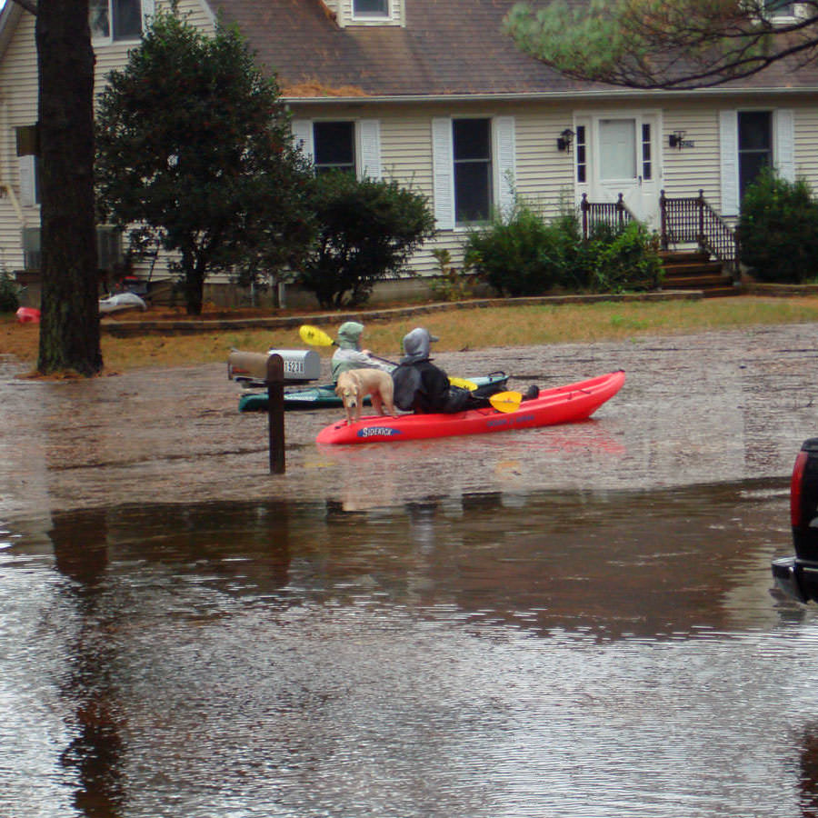 A flooded street on the bay side at the mouth of Onancock Creek, Virginia.