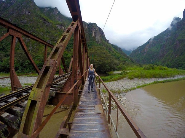 Photo of woman, Hannah Kerner, on a trail