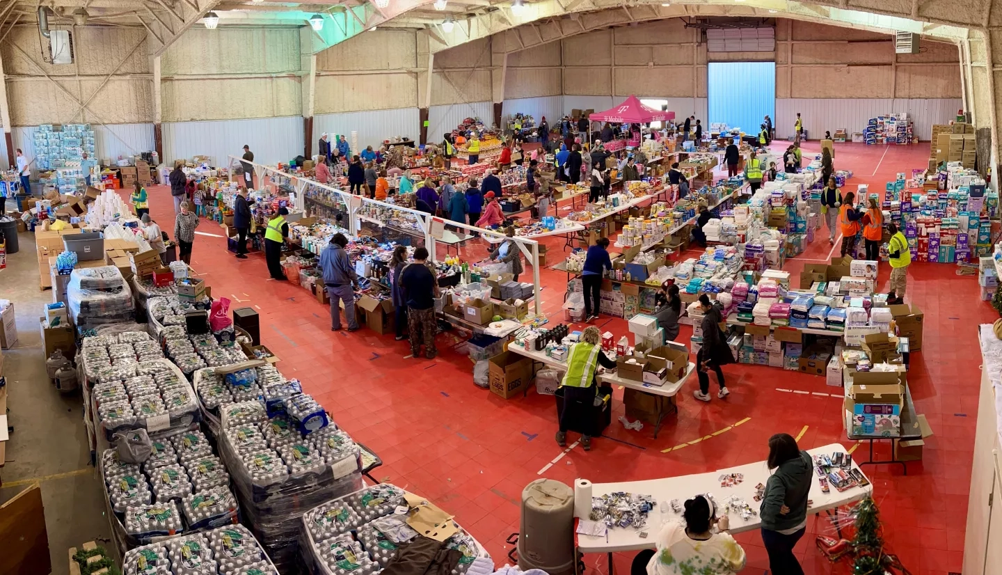 Humanitarian efforts underway at a donation center at the Mayfield-Graves County Fairgrounds in Mayfield, Kentucky on Dec. 13, 2021 after a series of tornadoes devastated the region. Credits: Timothy “Seph” Allen, NASA Disasters