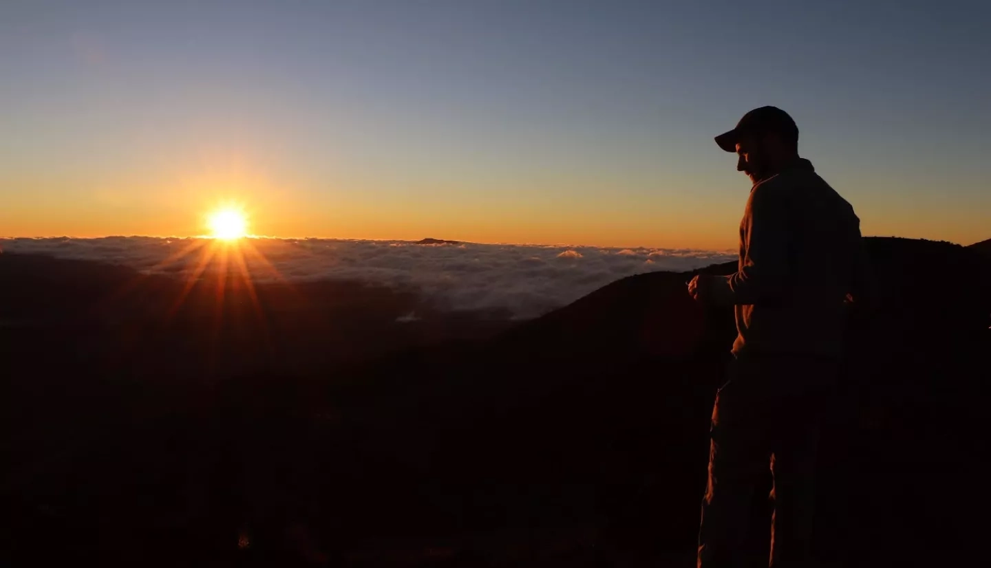 Sunset above the clouds at the Mauna Kea State Park, Hilo, Hawaii. Credits: Perry Oddo