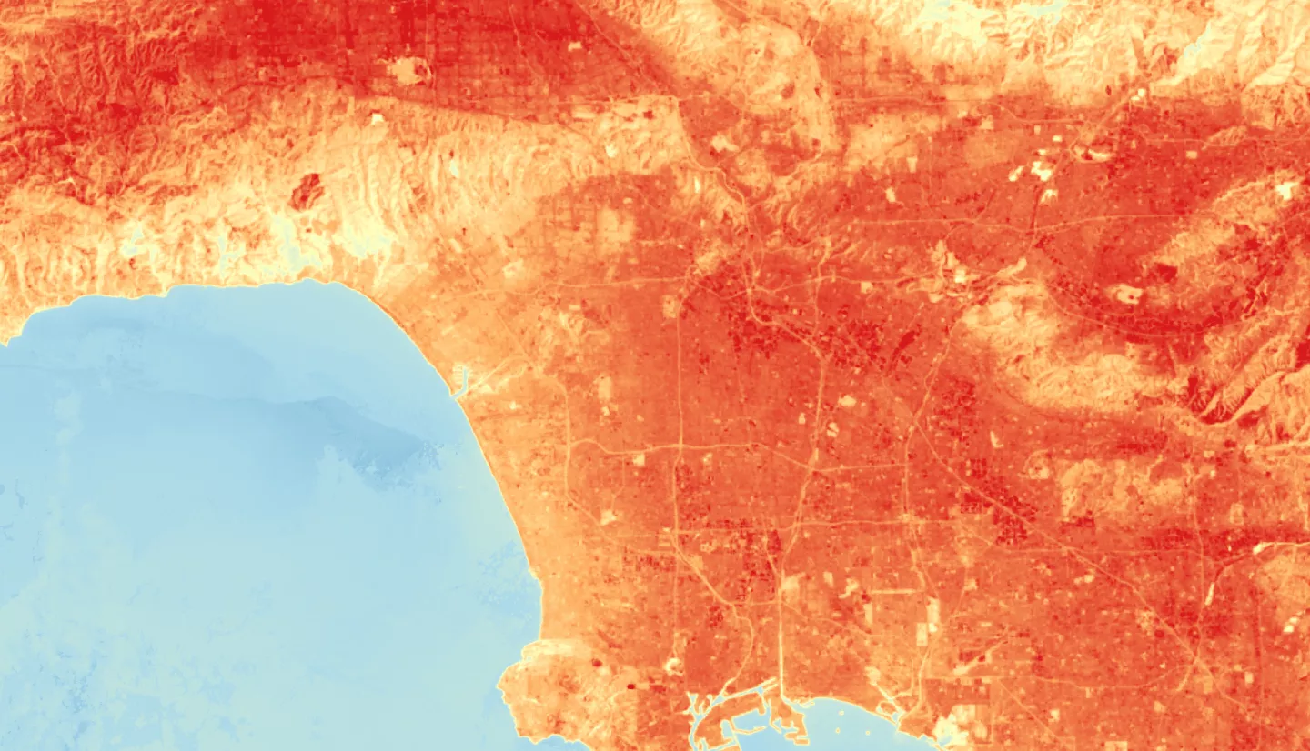 Median land surface temperature (LST) image over Los Angeles from June to August 2022, as derived from Landsat 8 TIRS data. Higher temperatures are shown in red, while cooler temperatures are displayed in blue. LST data can help investigate the impacts of urban cooling initiatives and inform urban planning decisions to mitigate the impacts of heat within the city.