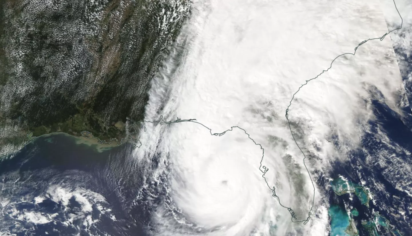 A satellite image of Hurricane Helene near Florida, with storm clouds extending far into the southeastern U.S.