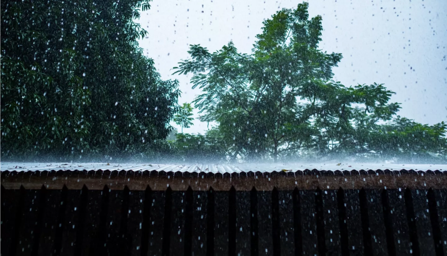 photo of rain on a roof