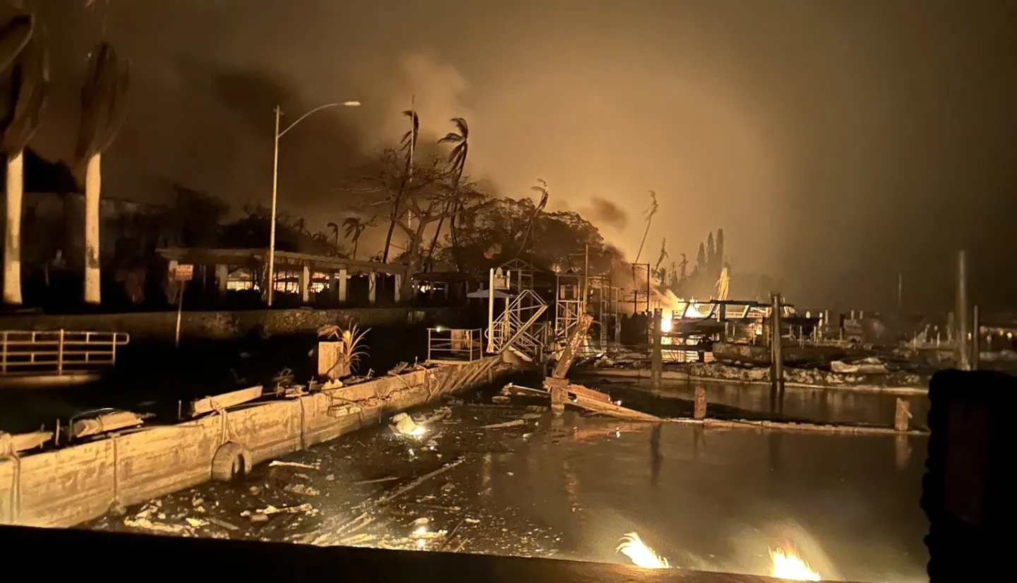 Wildfires rage in Lahaina, Maui as the U.S. Coast Guard and partners conduct rescue efforts. Credits: U.S. Coast Guard