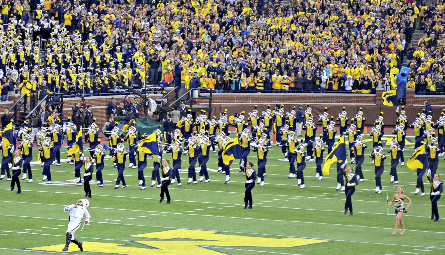 marching band performing on a football field