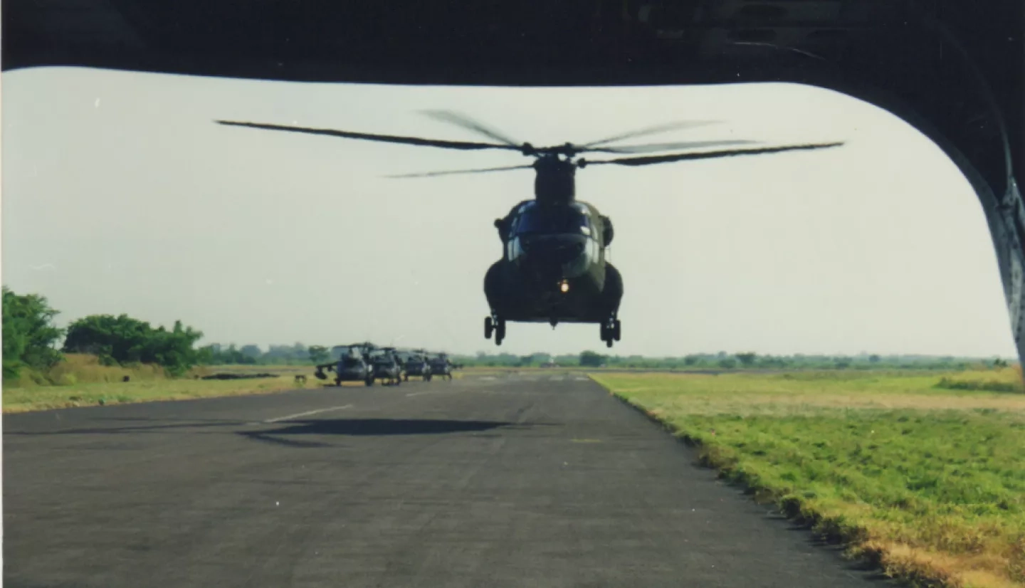 Lori Schultz took this image of a helicopter when she was deployed for Hurricane Mitch. While taking the image, Schultz was seated in the back of the helicopter looking at the one behind that took off at the same time. Credits: Lori Schultz