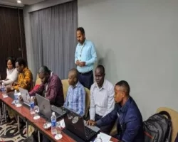 Image of men in conference room 