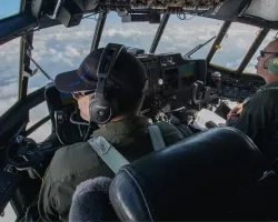 C-130 pilots Jim Lawson, left, and Paul Pinaud during a flight.