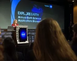 Sandra Cauffman, acting Director of the Earth Sciences Division of the Science Mission Directorate at NASA Headquarters, speaks during the 2019 Annual Earth Science Applications Showcase