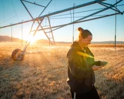 Photo of Nevada Denise Moyle in her alfalfa field