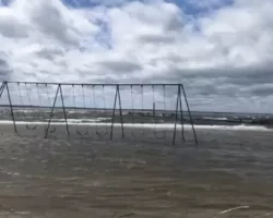 GIF of video of a swing set flooded