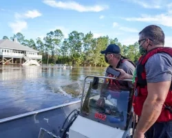 FEMA responders surveying flooded areas. Credits: FEMA