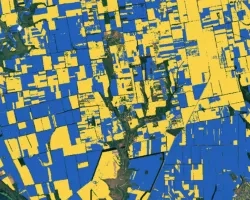 a blue and yellow colorized satellite image showing planted and planned crops in Ukraine