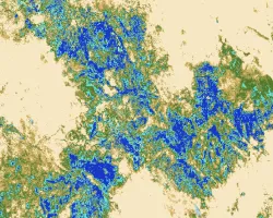 Median June composite of daily evapotranspiration from ECOSTRESS before the start of the Bootleg Fire on July 6th, 2021. Evapotranspiration is shown in millimeters per day across Klamath and Lake counties in Oregon, with dark blue indicating areas with higher evapotranspiration and light tan indicating lower evapotranspiration. Evapotranspiration is an indicator of vegetation moisture and can aid wildfire modeling by locating areas undergoing water-stress and susceptible to fire.