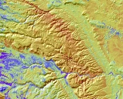 NDMI-index imagery from Landsat 8 OLI and SRTM data, taken on August 30, 2022. The image showcases vegetation water content in the northern part of Capitol Reef National Park. Blue regions indicate vegetation with higher moisture content, vital in semi-arid environments. In contrast, red and yellow regions suggest less hydrated vegetation. This image offers valuable insights into moisture dynamics in arid regions like Capitol Reef.