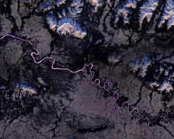 S17 NDWI calculation within the Alaskan east Kobuk river generated from NASA Landsat 8 OLI imagery taken on March 9th, 2023. The NDWI values, displayed above in a purple palate – pink displaying ice and purple displaying flowing water – were used to determine the dates of freezing. The NDWI calculation is overlayed on Sentinel-2 MSI imagery from October 26, 2022.