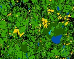 Land use land cover map derived from Landsat 9 OLI-2 imagery. This image depicts land cover in southwest Rhode Island on May 22, 2023. Disturbed/barren areas are black, open water is dark blue, agricultural land is yellow, upland habitat is light green, woody wetlands are dark green, and non-woody wetlands are light blue. Land use land cover maps can assist land managers in prioritizing land acquisition for conservation efforts.