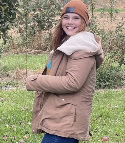 photo of woman in tan hat