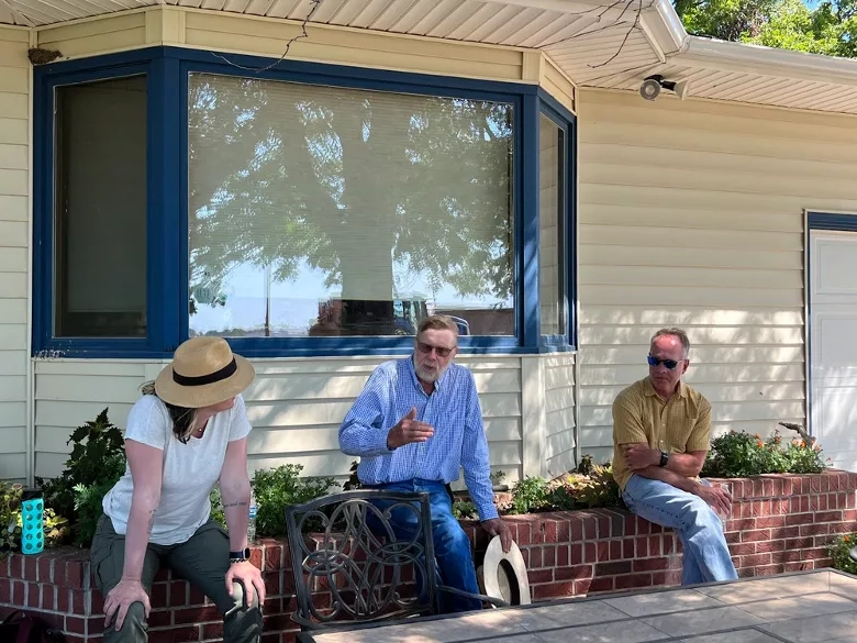 Don Batie (center) speaks with NASA Harvest’s Alyssa Whitcraft and NASA’s Brad Doorn at Batie Farms in Lexington, Nebraska. Credits: NASA