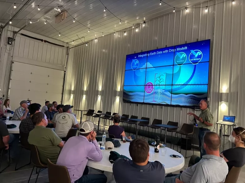 NASA’s Brad Doorn gives a presentation on how NASA earth observation data is being used to monitor environmental conditions like temperature, precipitation, and soil moisture among other metrics. Credits: NASA