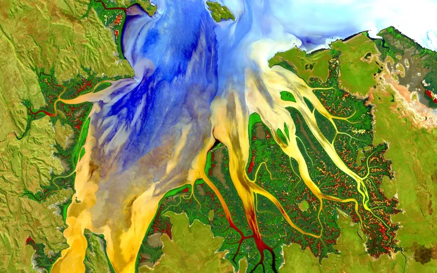 This image, captured by the Landsat 8 satellite, shows the view over Western Australia on May 12, 2013. The image shows rich sediment and nutrient patterns in a tropical estuary area and complex patterns and conditions in vegetated areas. Credits: NASA/USGS Landsat; Geoscience Australia